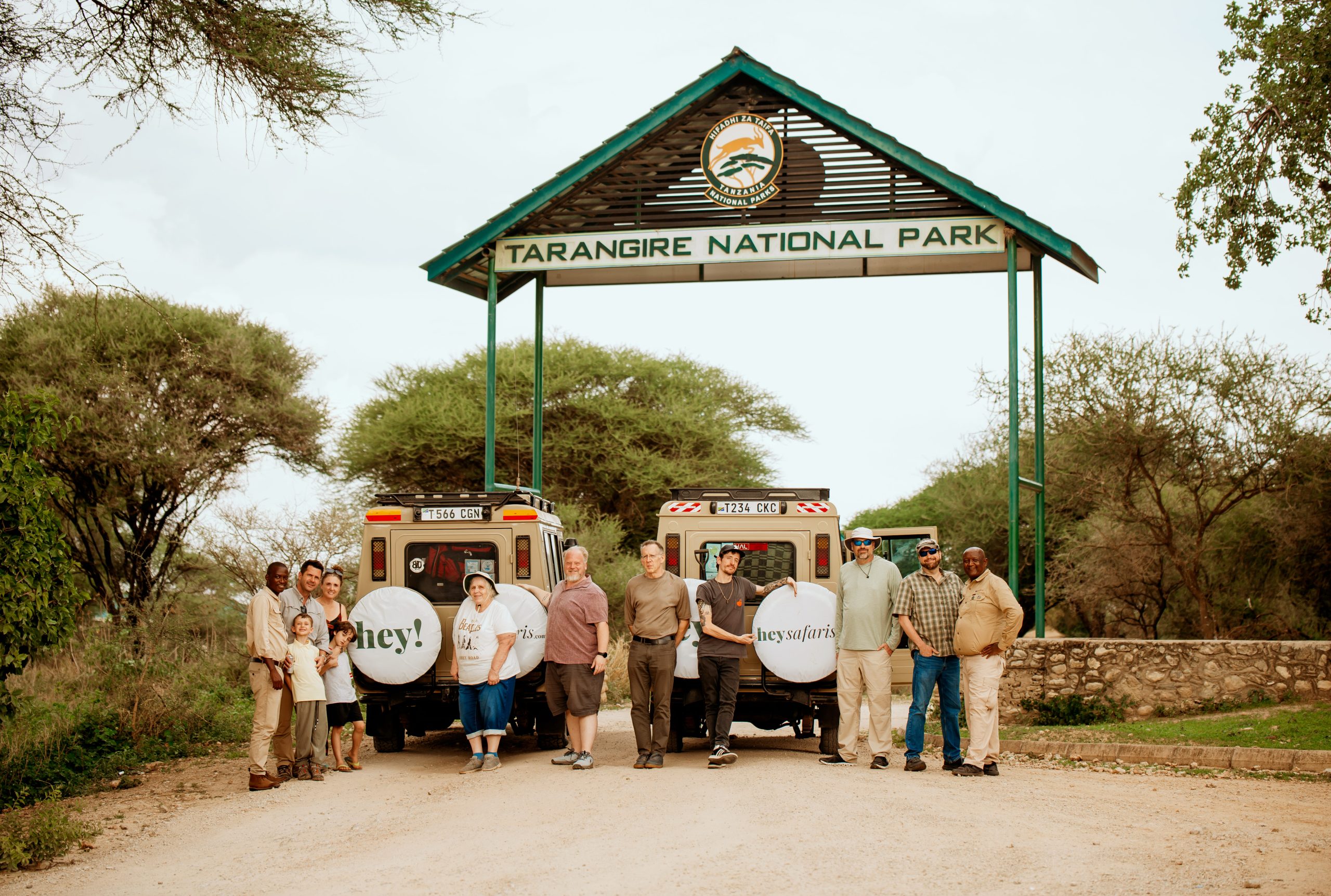 Family on safari at the Entrance to Tarangire National Park in Tanzania